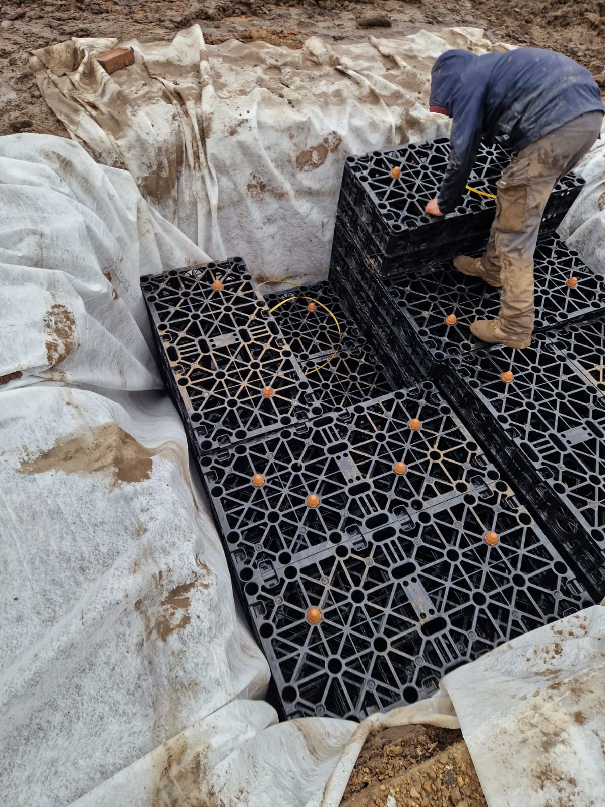 Soakaway crates being installed to manage surface water | groundworks and drainage in King's Lynn by Humphries Construction